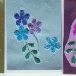 Painted embroidered organza flowers