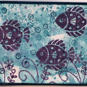 purple and blue fish