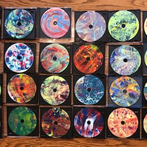"Swiped Acrylics" painted CDs