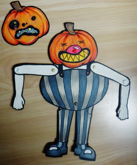 creepy pumpkin man art doll