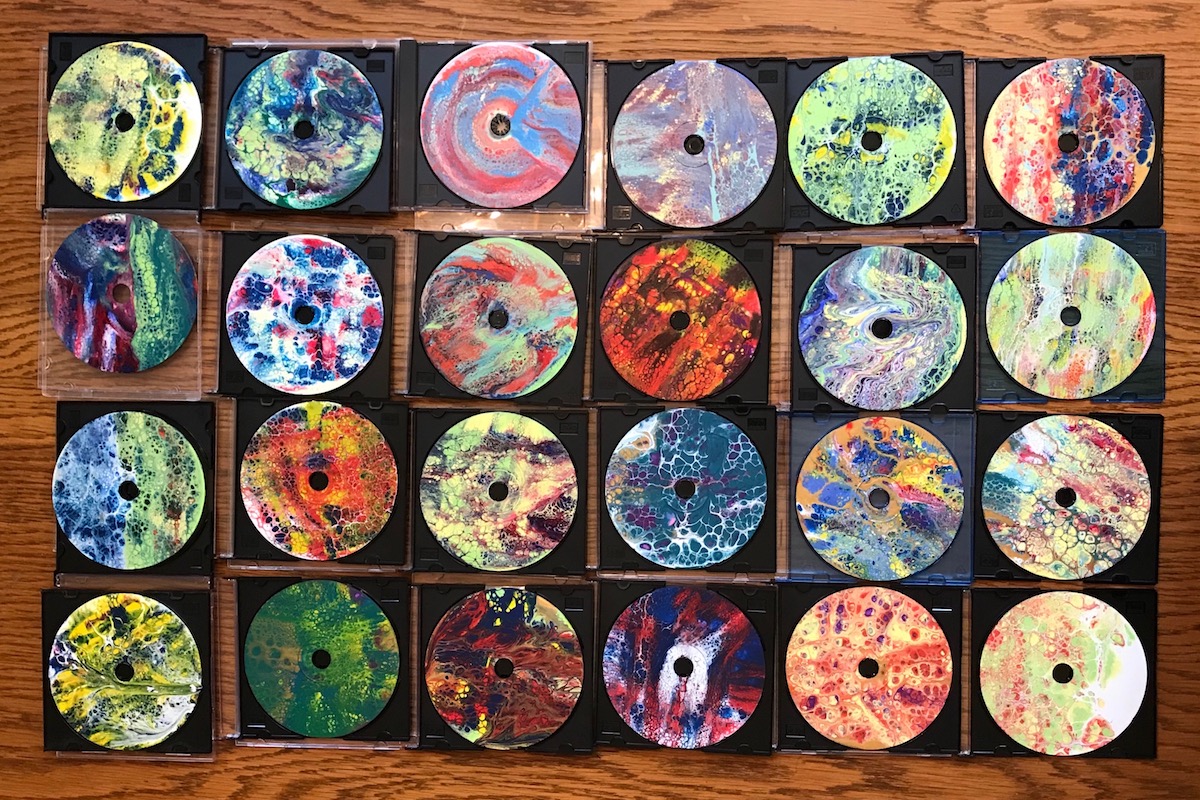 "Swiped Acrylics" painted CDs